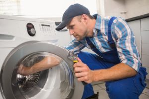 Stittsvile Appliance Repair Technician performing a washer repair